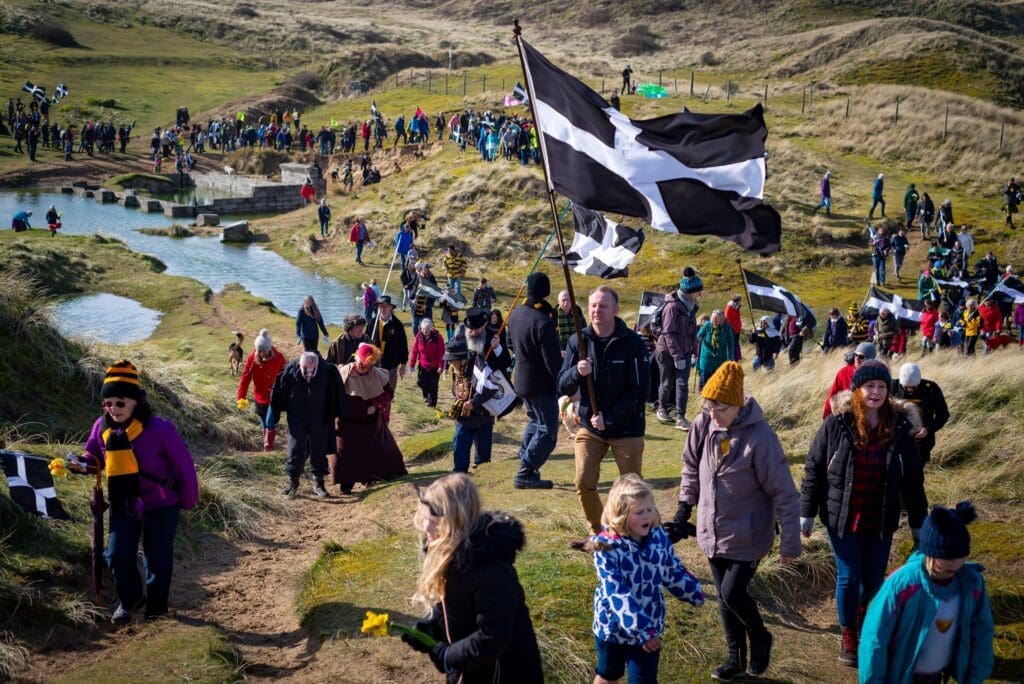 St Piran's Day: The annual march of Saint Piran in Cornwall is led by the saint and his disciples (Perranporth Dunes, Perranporth)