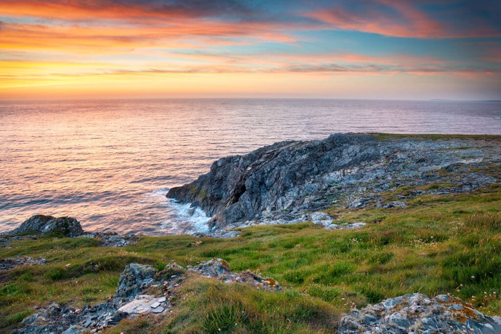 Sunset on the cliffs at West Pentire above Crantock, near Newquay, Cornwall