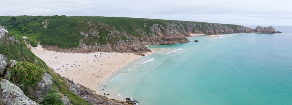 A panoramic view overlooking Porthcurno and Pedn Vounder Beach, Cornwall